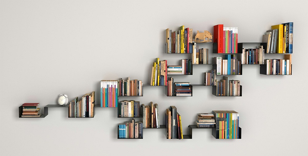 decorating a wall with books